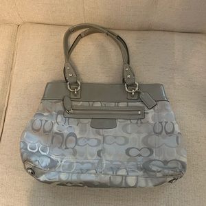 Gray coach purse with purple lining